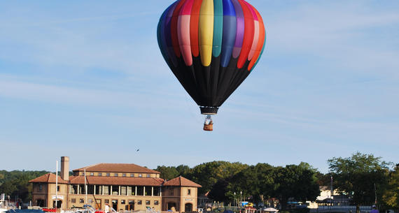 hot air balloon over riviera lake geneva beach