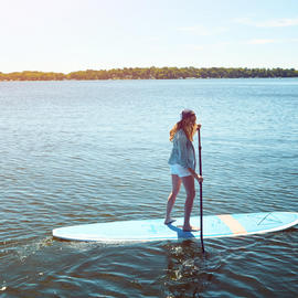 woman on stand up paddleboards