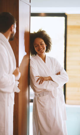 couple in spa robes