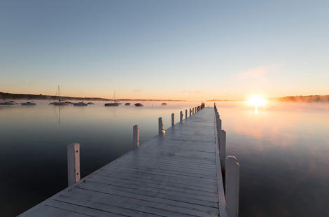 sunrise over lake geneva from fontana pier